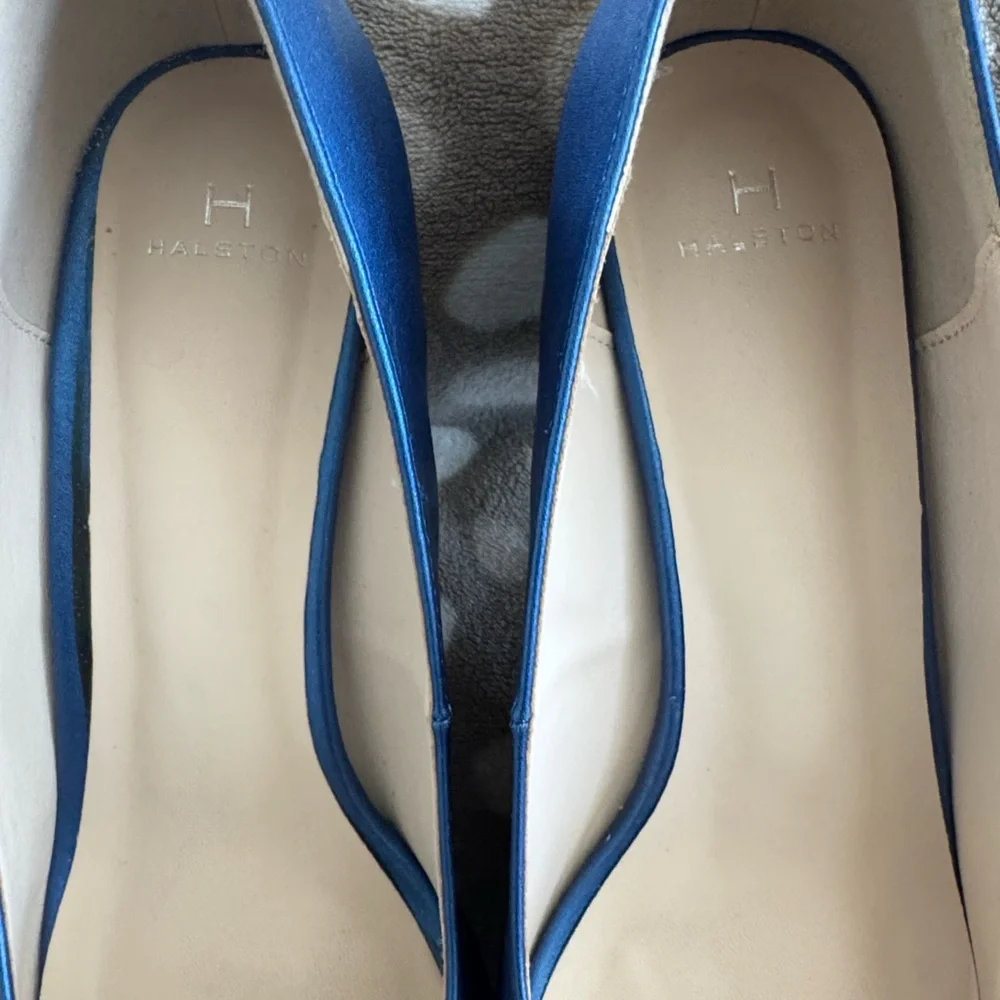 Vintage inspired elegance by Halston.  Vegan leather, rubber sole.